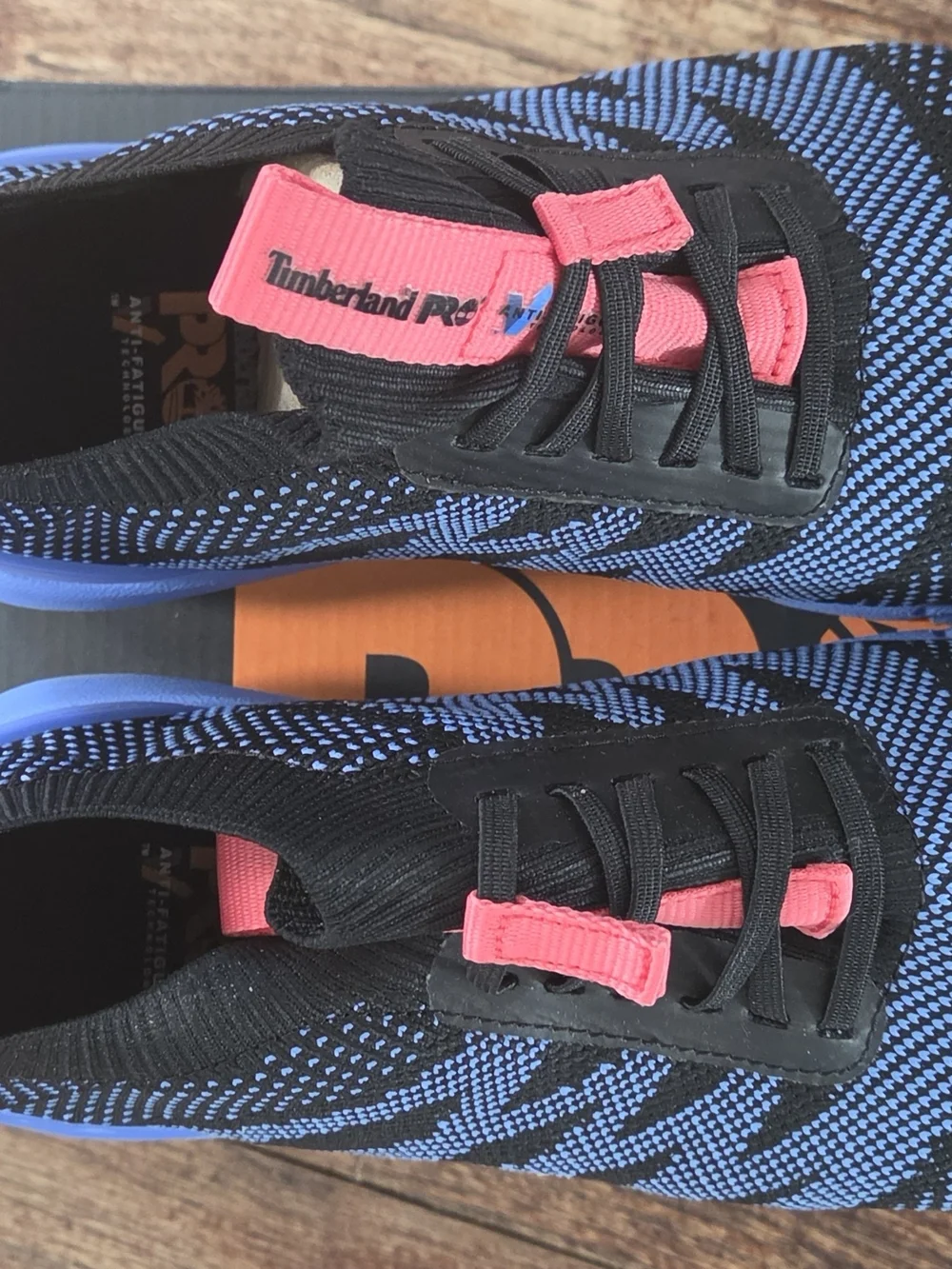 Women’s Blue Knit Slip-On Sneakers with Pink Accents